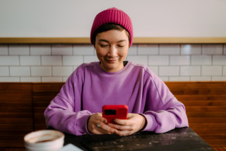 Woman smiling on phone